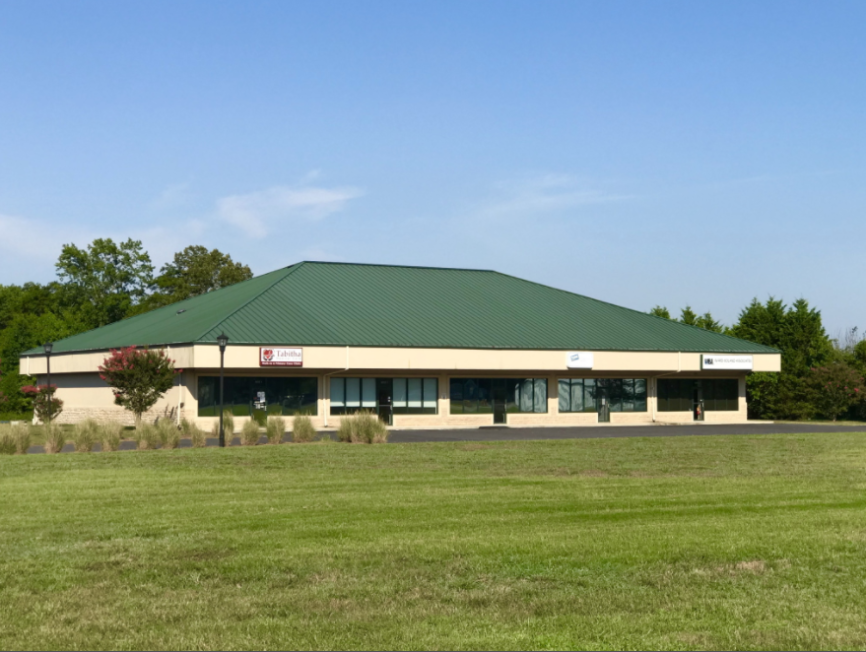 A building with a green roof in the Stone Creek Business Park.